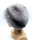 Back three-quarter view of women’s silver fox fur hat, round shape without ear flaps