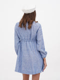 Women's summer beret hat white linen, full body view with blue linen V-neck mini dress