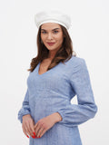 Women's white linen beret side profile close-up showing flat crown and clean white color