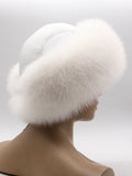 Yaroslavna white fox hat from behind on the right, leather panels and fluffy band