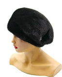 Black gathered mink fur beret lower side profile showing tuck distribution around crown base