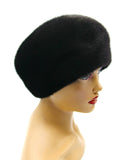 Black mink gathered beret left side profile showing tuck construction ridges and rounded crown shape