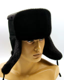 Back view black suede ushanka earflaps tied up