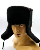Side view black mink suede ushanka earflaps down