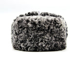 Close-up grey karakul curly fur texture detail