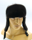 Profile view man wearing black mink fur hat leather bomber ushanka