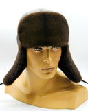Man wearing brown mink ushanka earflaps down front