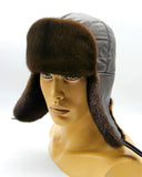 Man wearing brown mink leather ushanka earflaps down side