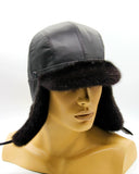 Man wearing mink leather bill ushanka earflaps down coverage