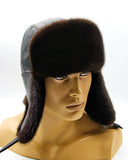 Man wearing mink leather ushanka earflaps down side
