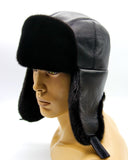 Man wearing mink fur hat leather ushanka earflaps down side