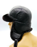 Top-down view black leather crown mink bill ushanka
