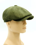 Olive velvet newsboy cap front view on mannequin