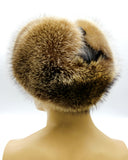 Raccoon fur ushanka earflaps tied back position