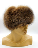 Three-quarter front raccoon fur ushanka showing volume