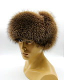 Side view raccoon fur ushanka earflaps secured up