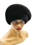 Women's black gathered mink fur beret front view showing pleated tuck pattern across dome crown
