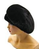 Women's black mink fur beret back view showing full rounded crown construction and natural black mink