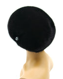 Women's black mink gathered beret back view showing full tuck coverage and crown construction